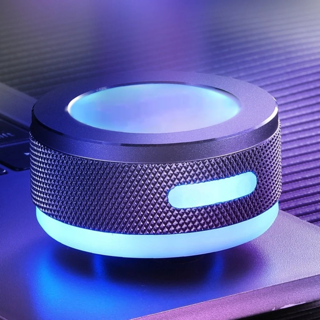 Close-up of the SONVEX Pulse compact metal body with textured grip and glowing LED light