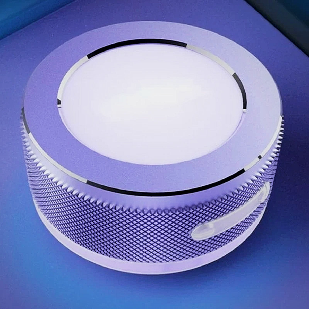 SONVEX Pulse Mini Surface Speaker in purple with glowing RGB light ring